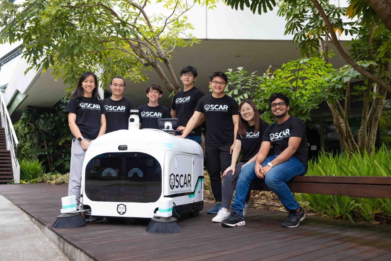 Project OSCAR team with the robot
